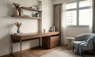 Compact 2-room Flexi study corner with wooden desk, floating shelves, grey armchair, and natural window light.