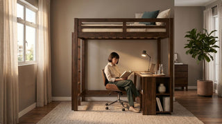 Wooden bed with study table underneath styled with laptop, task lamp and chair in a warm modern bedroom