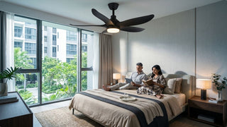 Black LED ceiling fan with light above a cosy modern Singapore condo bedroom