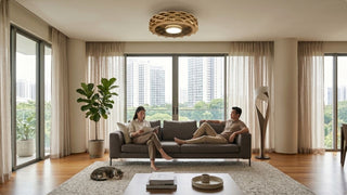 Acorn bladeless ceiling fan with light in a bright living room with sofa, balcony views and warm modern decor