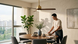 A ceiling fan with an integrated light keeps the dining area comfortable while maintaining a clean, modern look