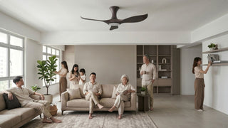Ceiling fan in a bright Singapore living room with multi-generational family, sofas, built-in shelves, and large HDB windows