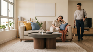 Coffee table in a Singapore living room with sofa, TV console, and modern home styling
