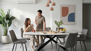 Comfortable dining table in a Singapore home set up for family meals and hosting