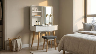 Compact white dressing table with mirror, shelves and stool in a small Singapore bedroom beside a bed and window