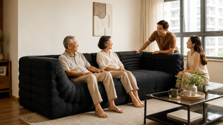 Elderly parent sitting comfortably on a sofa in a Singapore home