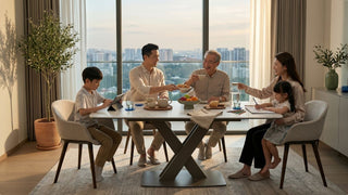 Family sharing snacks around an adjustable height dining table in a warm Singapore dining room with city views