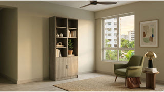 Freestanding storage cabinet with shelves and closed doors in a cosy HDB living room corner
