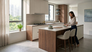 Modern Singapore condo kitchen with built-in gas hob, island counter and warm wood cabinetry.