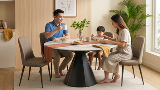 Granite dining table in a Singapore dining room with elegant hosting setup and modern chairs