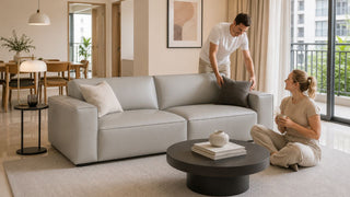 Grey 3-seater sofa in a bright Singapore maisonette living room with clear walking space and a practical open-plan layout