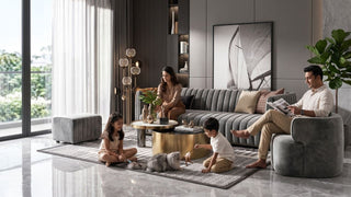 Grey velvet sofa with family and children in a bright Singapore living room with pet-friendly styling