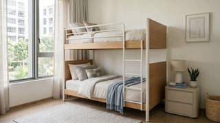 Kids double bunk bed in a bright Singapore bedroom with wood panels, white rails, and soft neutral bedding.