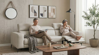 Cream leather reclining sofa with extended footrest in a calm Singapore living room