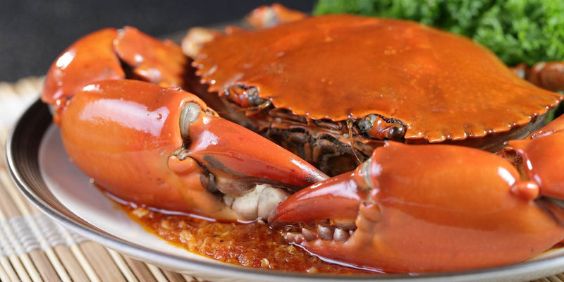 Mastering Singapore's Famous Chili Crab with Cast Iron Cookware: A Flavorful Adventure