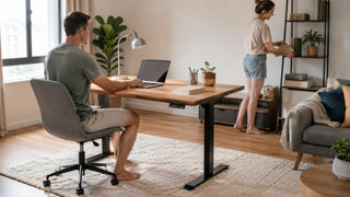 160cm wooden desk in a modern Singapore home office with a couple setting up a practical work area