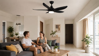 Black ceiling fan with LED light in a modern Singapore living room for a relaxed MegaFurniture home setting