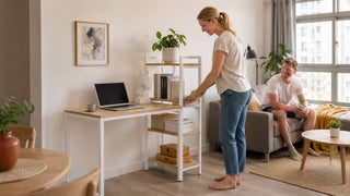 Collapsible computer desk with open shelving in a modern Singapore living room for a practical home office setup