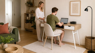 Collapsible computer desk in a warm Singapore home office corner with a couple using the workspace in a practical HDB-style living area.