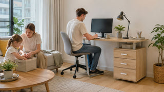 Family using a light wood computer desk with storage in a modern Singapore apartment living room