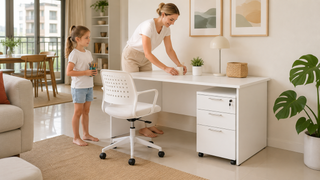 Practical white computer desk with storage in a bright Singapore family home workspace