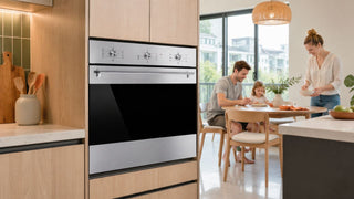 Built-in convection oven in a modern Singapore kitchen with family dining nearby