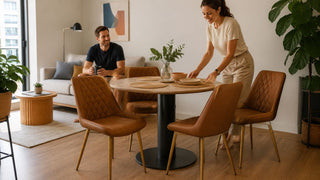 Caramel brown quilted dining chairs around a compact table in a modern Singapore condo dining area