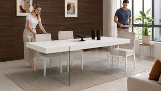 Floating dining table in a modern Singapore dining area with a couple preparing the space for everyday meals.