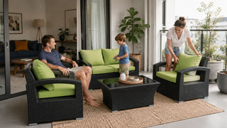 MegaFurniture garden furniture set with green cushions on a bright Singapore balcony for relaxed family seating.