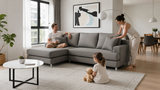 Grey L-shaped sofa in a bright Singapore condo living room with a family-friendly layout and clear walking space.