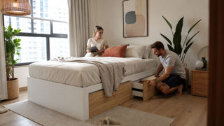 Japandi bedroom with storage bed in a modern Singapore apartment styled with warm neutrals and natural wood