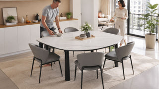 Modern marble dining table set in a bright Singapore condo dining area for empty nesters refreshing their home