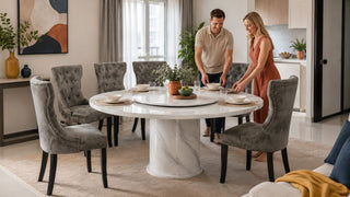 Marble dining table with grey tufted chairs in a modern Singapore home dining area prepared for family meals