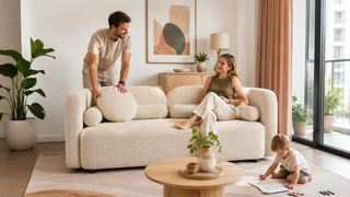 Cream bouclé modern sofa in a bright Singapore condo living room with a relaxed family setting.