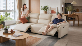 Beige reclining sofa in a modern Singapore living room with a relaxed family setting for MegaFurniture