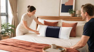 White and navy pillow styled on a modern Singapore bedroom bed for a practical online pillow buying guide