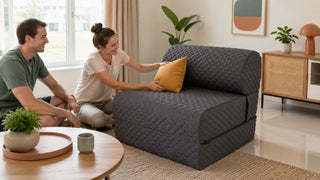 Quilted sofa bed styled in a modern Singapore living room for practical guest seating and everyday comfort