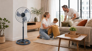 Stand fan in a modern Singapore living room with a family arranging cushions for better everyday comfort.