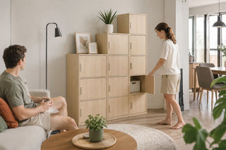 Light wood storage cabinet in a modern Singapore living room with open storage for practical home organisation.