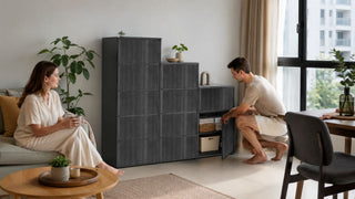 Stepped charcoal storage cabinet in a modern Singapore living room with organised household storage
