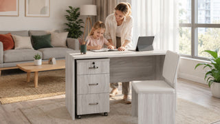 Light grey study table with drawers and matching chair in a bright Singapore home study corner with a parent helping a child.