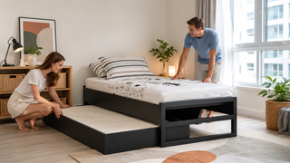 Trundle bed frame with pull-out guest bed in a bright modern Singapore apartment bedroom, styled for practical compact living.