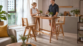 Wooden bar table set in a modern Singapore condo living and kitchen area for casual hosting