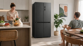 Dark grey Midea fridge in a modern Singapore kitchen with groceries and a practical family dining area