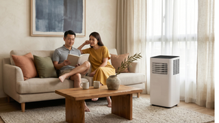 Mini air conditioner in a Singapore bedroom with proper cooling setup and window venting