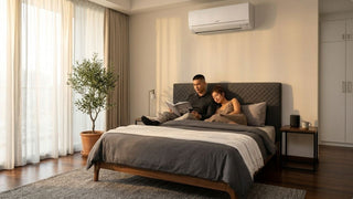 Mitsubishi aircon above a bed in a warm modern Singapore bedroom with large windows