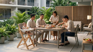 Toddler seated in an outdoor high chair during a family meal on a Singapore condo patio