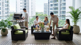 Friends hosting on a Singapore condo patio with outdoor wicker sofa set, BBQ, and balcony seating