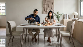 Quartz dining table with beige chairs in a bright Singapore HDB dining area for everyday meals