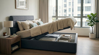 Queen storage bed with gas-lift base open in a bright Singapore condo bedroom